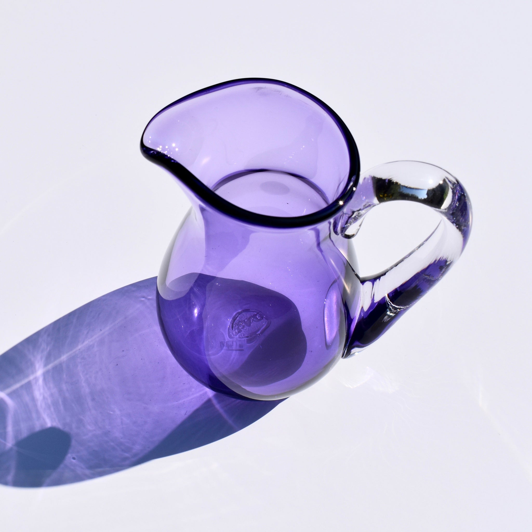 Purple deals pressed glass pitcher