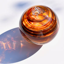 Load image into Gallery viewer, Amber &amp; Orange Streaky Glass Bauble
