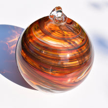 Load image into Gallery viewer, Amber &amp; Orange Streaky Glass Bauble

