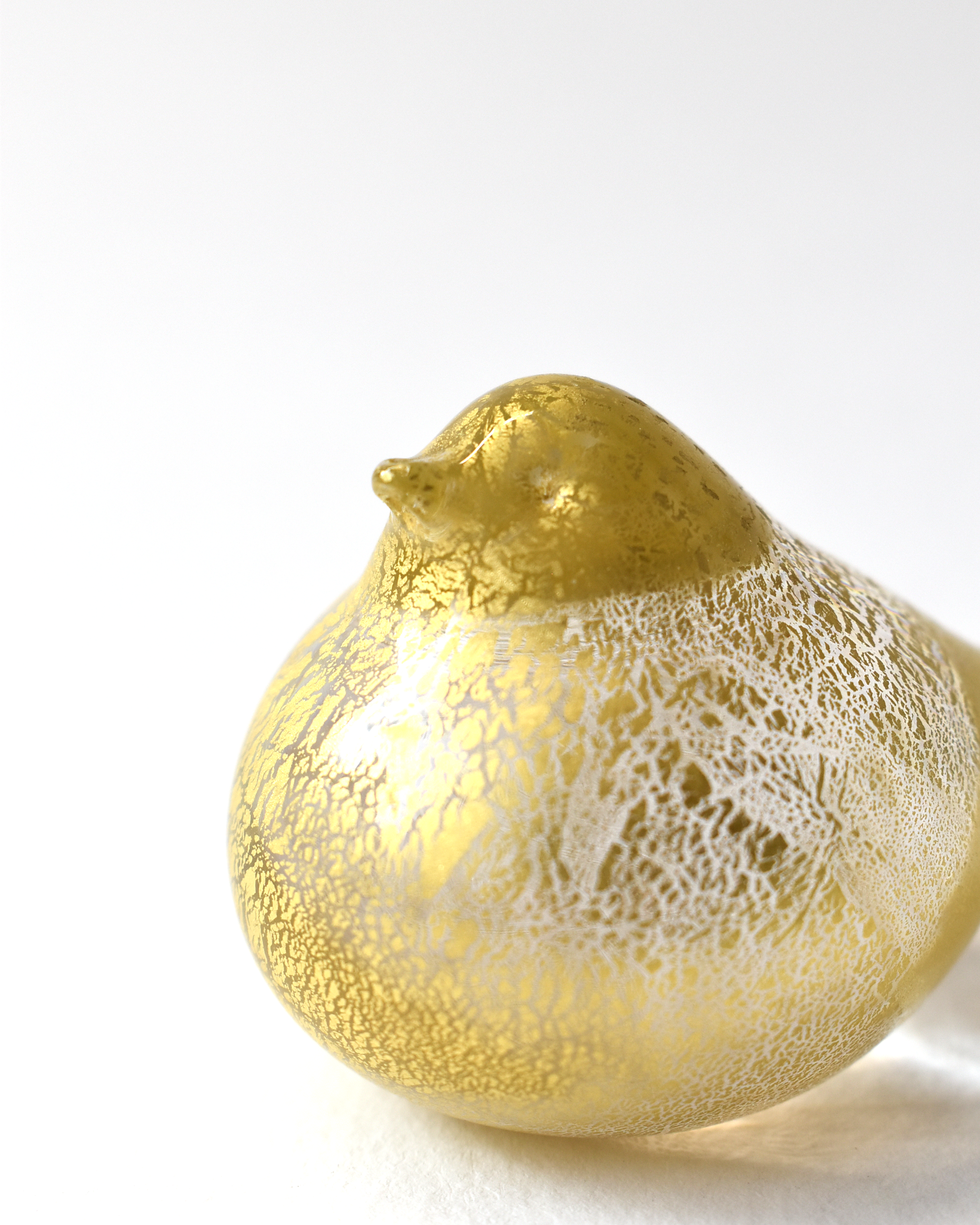 Gold Leaf Nesting Bird
