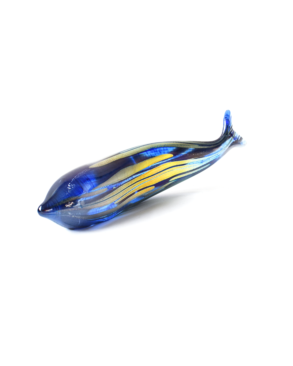 Glass sculpture of a fish with blue and yellow patterns on a white background