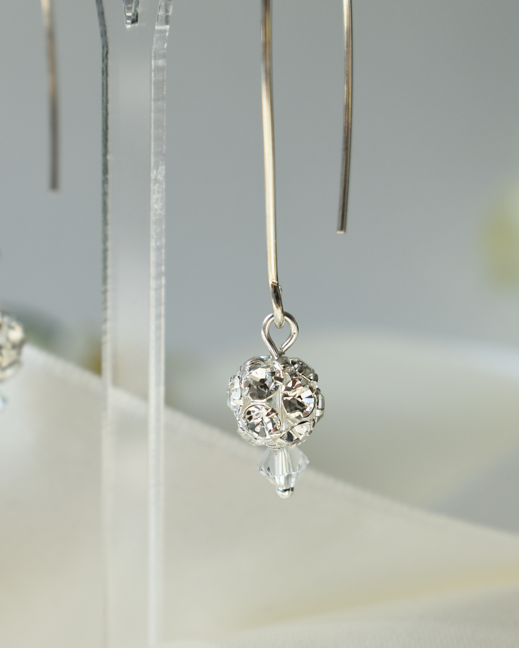 Crystal Ball Silver Arc Earrings