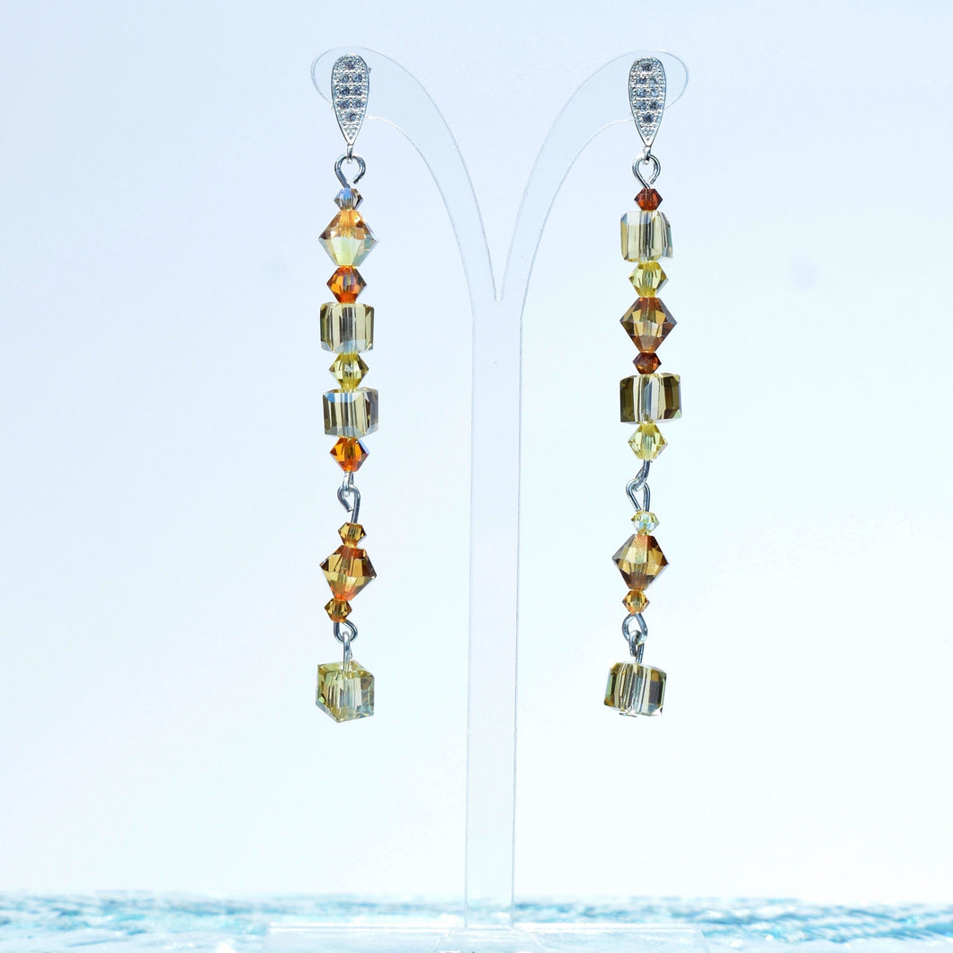 One of a kind stunning drop earrings with Austrian crystal and glass beads.  Sterling silver stud earring finding.  Earring length 6.5cm